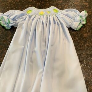 Grace and Lilly‘s closet smocked light blue dress.